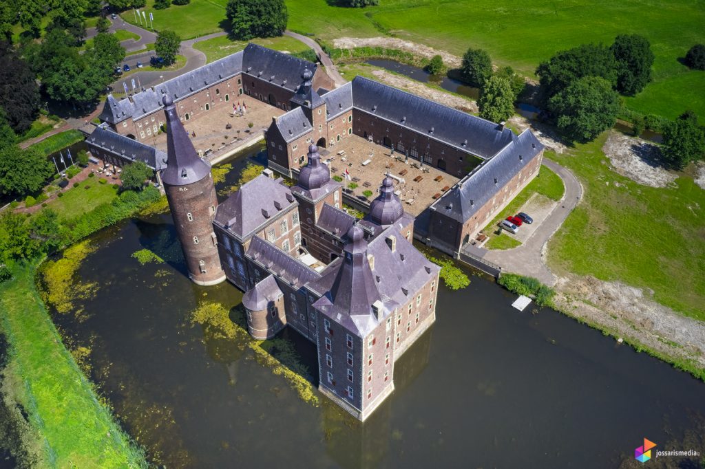 a castle surrounded by water