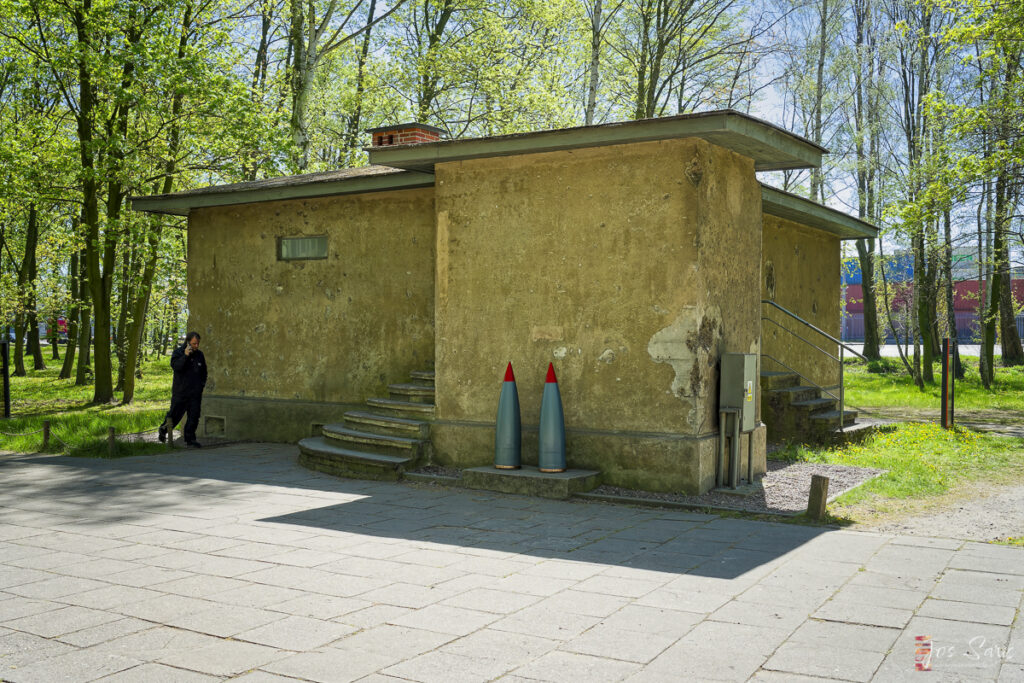 a building with a couple of rockets in front of it