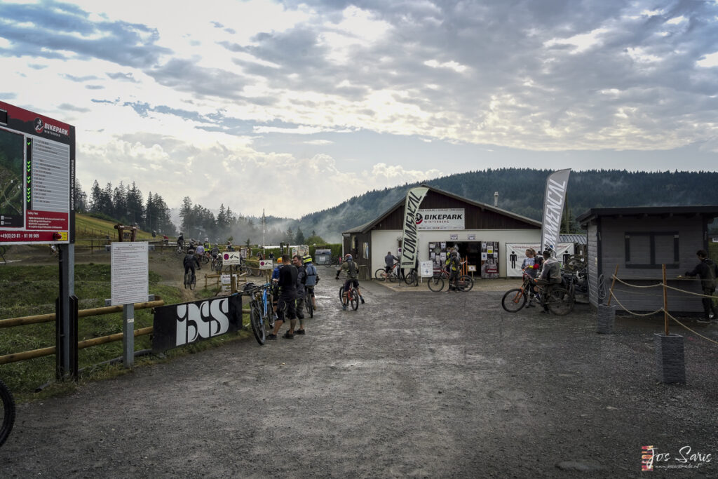 a group of people on bicycles outside a building