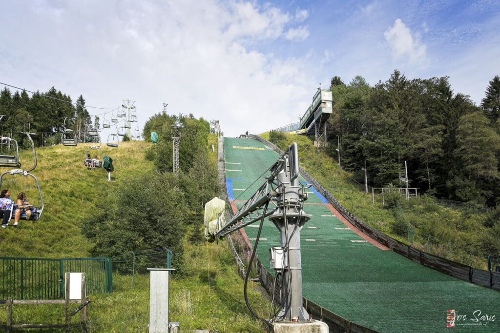 a ski lift going down a hill