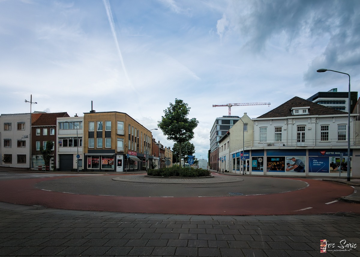 a circular road with buildings around it