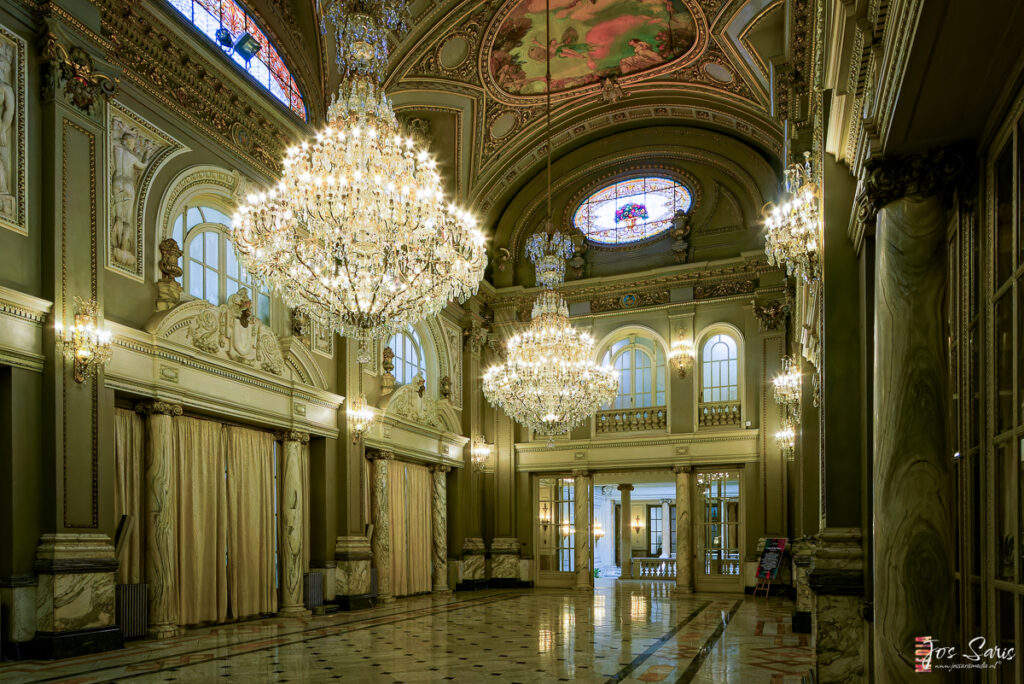 a large ornate building with chandeliers