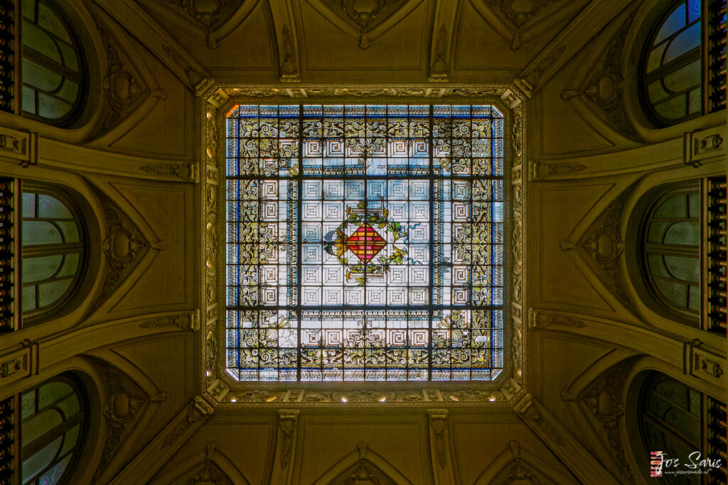 a stained glass window in a ceiling